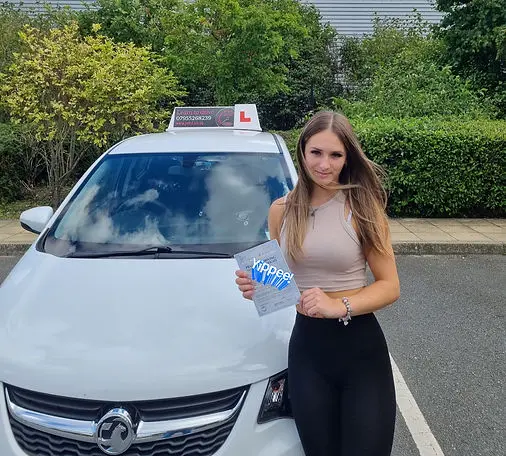 Successful driving test pass certificate held by student 1 who learned with Jo Learn To Drive driving school