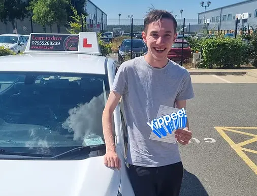 Successful driving test pass certificate held by student 2 who learned with Jo Learn To Drive driving school