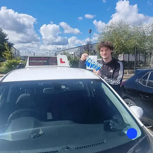 Successful driving test pass certificate held by student 8 who learned with Jo Learn To Drive driving school
